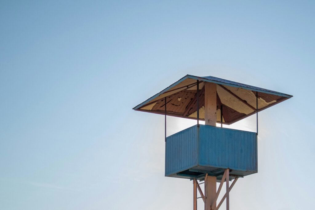 blue tower under clear blue sky